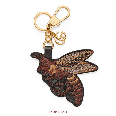 gucci bee keychain|Gucci leather keychain.